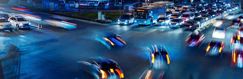 Cars speeding through an intersection serving as an analogy for attracting visitors