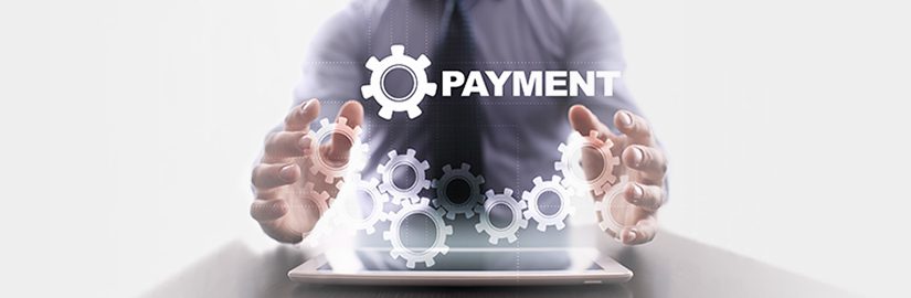 Sitting behind a tablet with gears coming out